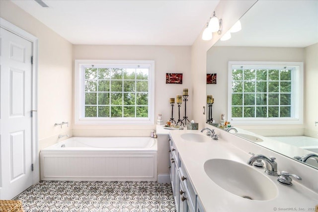 6 Faith Ln Unit 6, Danbury, CT 06810 - bathroom with a garden tub, double vanity, and tile patterned floors