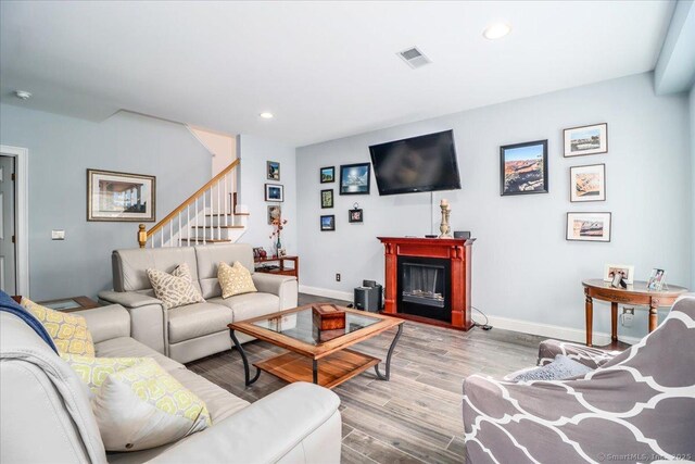 6 Faith Ln Unit 6, Danbury, CT 06810 - living room featuring stairs, wood finished floors, recessed lighting, and a fireplace