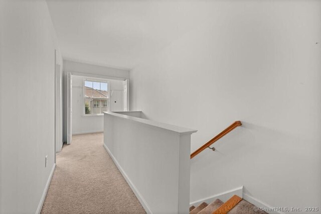 3 Riverview Ct Unit 3, Brookfield, CT 06804 - hall featuring an upstairs landing and light carpet