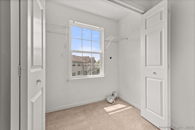 3 Riverview Ct Unit 3, Brookfield, CT 06804 - laundry area featuring carpet flooring and baseboards