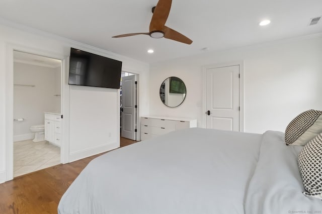 109 W Ave, Darien, CT 06820 - bedroom with crown molding, recessed lighting, wood finished floors, connected bathroom, and ceiling fan