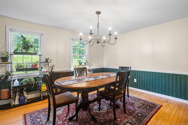 97 Wildwood Cir, Durham, CT 06422 - dining area featuring hardwood / wood-style floors, wainscoting, and a chandelier