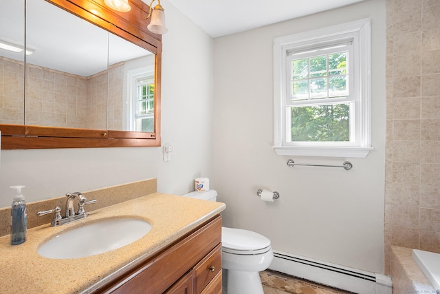97 Wildwood Cir, Durham, CT 06422 - bathroom featuring baseboard heating, plenty of natural light, vanity, and a bathtub