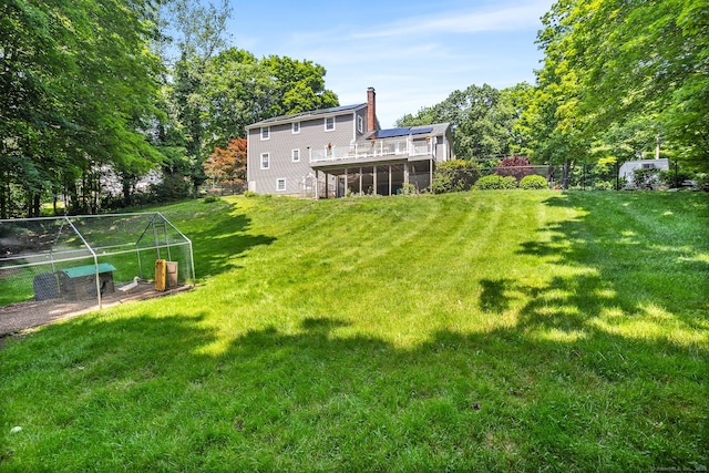97 Wildwood Cir, Durham, CT 06422 - view of yard featuring a sunroom and a wooden deck