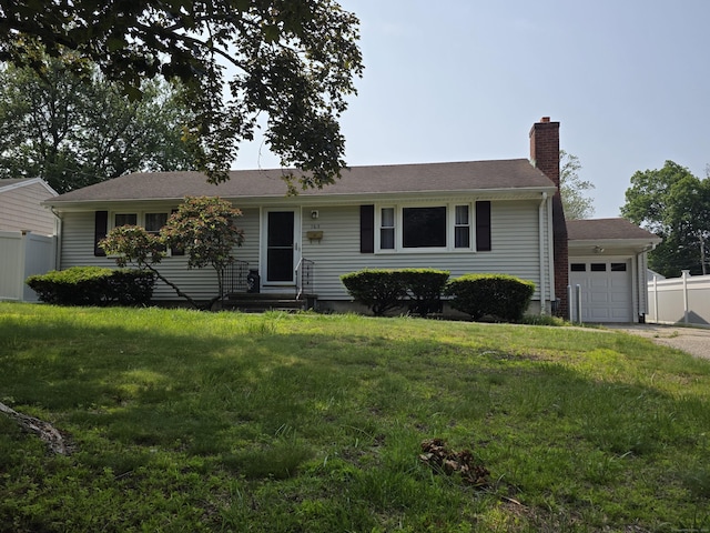165 Douglas St, Stratford, CT 06614 - ranch-style home featuring an attached garage, a chimney, entry steps, and driveway