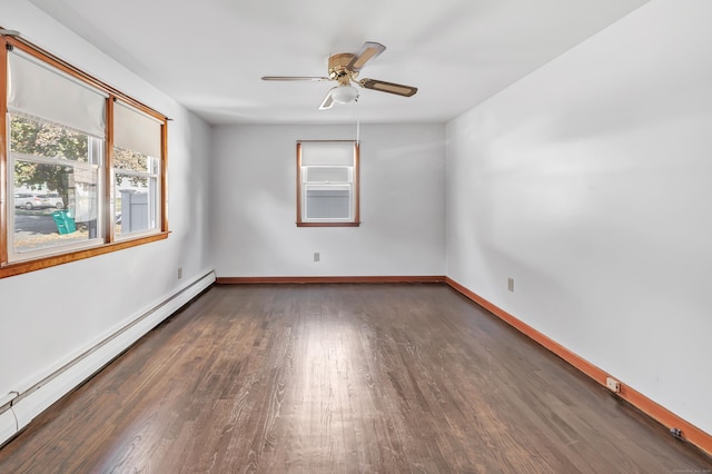 165 Douglas St, Stratford, CT 06614 - spare room featuring baseboard heating, wood finished floors, and ceiling fan