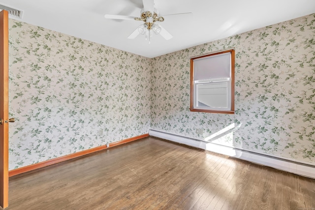 165 Douglas St, Stratford, CT 06614 - empty room with wallpapered walls, wood-type flooring, baseboard heating, and a ceiling fan