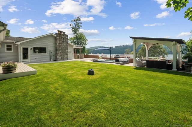 113 N Lake Shore Dr, Brookfield, CT 06804 - view of green lawn with outdoor lounge area and a patio