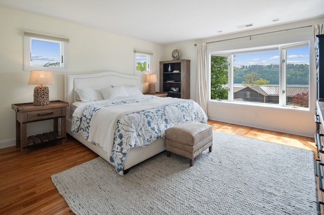 113 N Lake Shore Dr, Brookfield, CT 06804 - bedroom with wood finished floors and baseboards