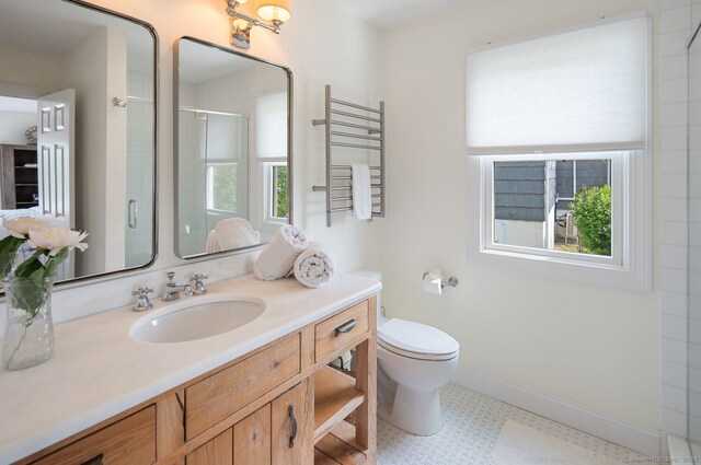 113 N Lake Shore Dr, Brookfield, CT 06804 - full bathroom featuring vanity, tile patterned floors, an enclosed shower, and a towel warming rack