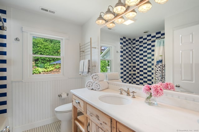 113 N Lake Shore Dr, Brookfield, CT 06804 - bathroom featuring healthy amount of natural light, a shower with shower curtain, vanity, wainscoting, and tile patterned floors
