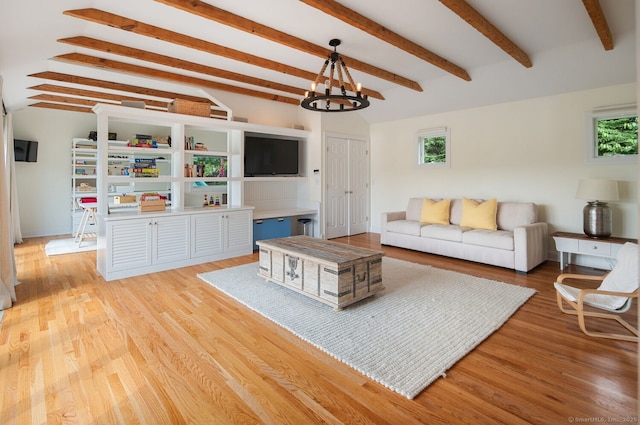 113 N Lake Shore Dr, Brookfield, CT 06804 - living area featuring healthy amount of natural light, light wood-type flooring, a chandelier, and beamed ceiling