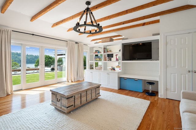 113 N Lake Shore Dr, Brookfield, CT 06804 - living area featuring beamed ceiling, a chandelier, french doors, and light wood finished floors