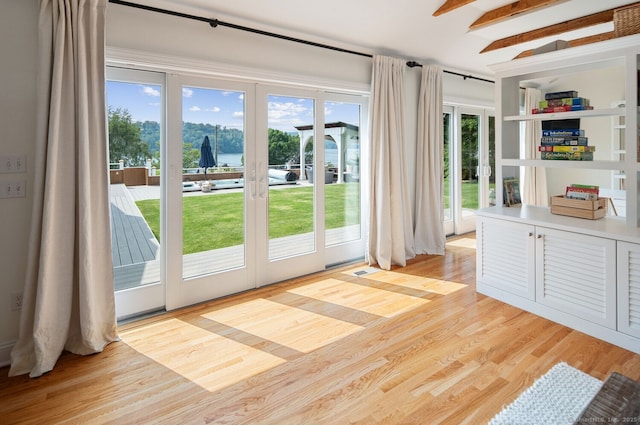 113 N Lake Shore Dr, Brookfield, CT 06804 - doorway to outside with french doors, light wood-type flooring, and beamed ceiling