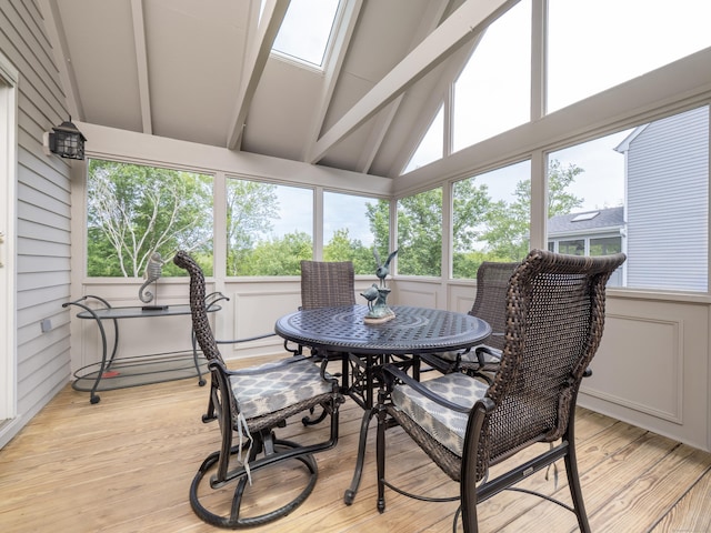 120 Prospect St Apt 63, Ridgefield, CT 06877 - sunroom featuring wood finished floors, a skylight, and a decorative wall