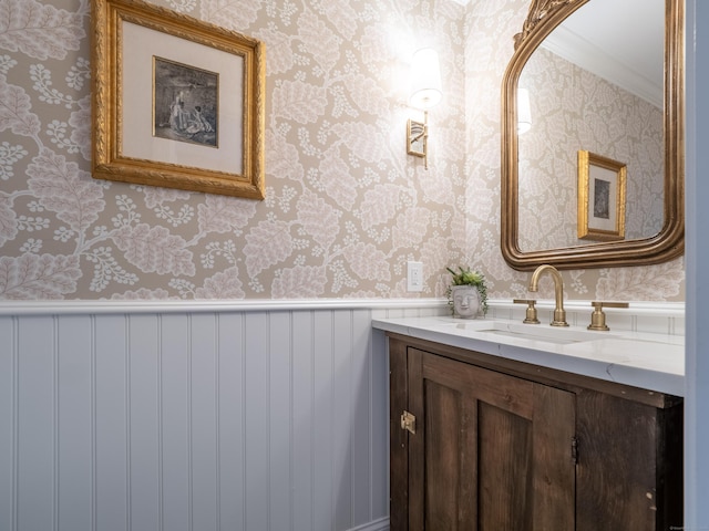 120 Prospect St Apt 63, Ridgefield, CT 06877 - bathroom featuring vanity, wallpapered walls, and crown molding