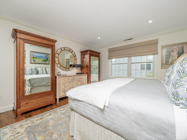 120 Prospect St Apt 63, Ridgefield, CT 06877 - bedroom with ornamental molding, wood finished floors, and recessed lighting