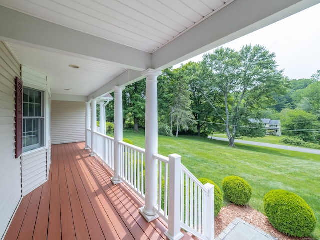 11 Scodon Dr, Ridgefield, CT 06877 - wooden porch featuring a lawn
