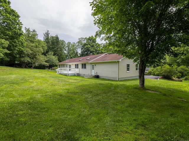 11 Scodon Dr, Ridgefield, CT 06877 - view of grassy yard featuring a wooden deck