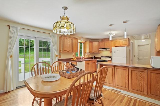11 Scodon Dr, Ridgefield, CT 06877 - dining space with healthy amount of natural light, light wood-type flooring, and attic access