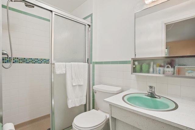 11 Scodon Dr, Ridgefield, CT 06877 - full bath featuring a stall shower, vanity, and tile walls