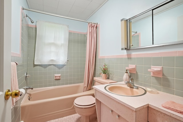 11 Scodon Dr, Ridgefield, CT 06877 - full bathroom featuring shower / tub combo with curtain, vanity, tile walls, and tile patterned flooring