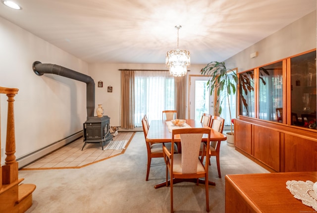 348 State Route 39, New Fairfield, CT 06812 - dining room with a baseboard radiator, a chandelier, light carpet, a wood stove, and recessed lighting