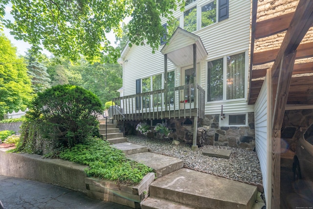 348 State Route 39, New Fairfield, CT 06812 - view of property exterior with a wooden deck and stairs
