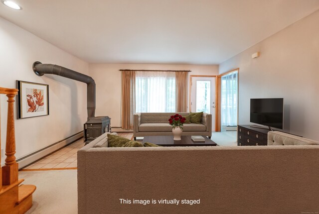 348 State Route 39, New Fairfield, CT 06812 - living room with baseboard heating, a wood stove, and recessed lighting