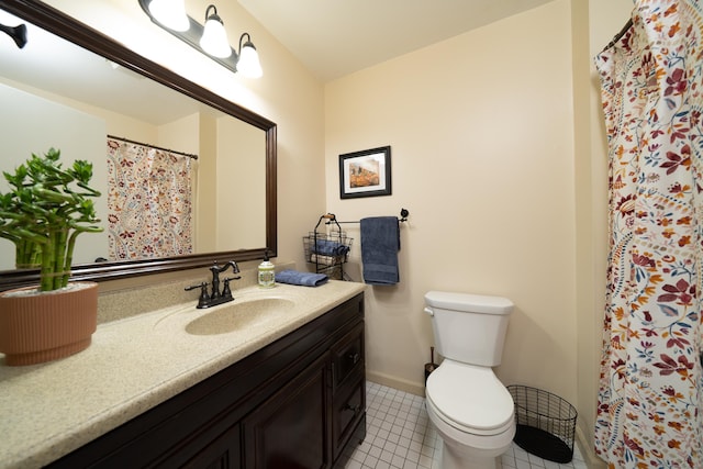 267 Melba St Apt B13, Milford, CT 06460 - bathroom featuring vanity, tile patterned flooring, and curtained shower