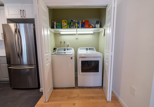267 Melba St Apt B13, Milford, CT 06460 - laundry room with washer and dryer and light wood-type flooring