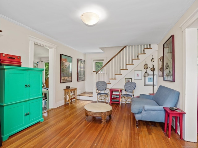 58 Riverdale Ave, Greenwich, CT 06831 - sitting room featuring stairway, wood finished floors, plenty of natural light, and ornamental molding