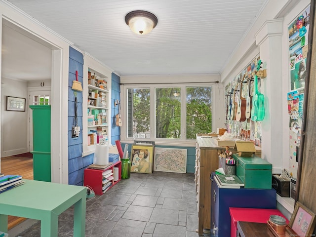 58 Riverdale Ave, Greenwich, CT 06831 - sunroom featuring stone finish flooring and crown molding