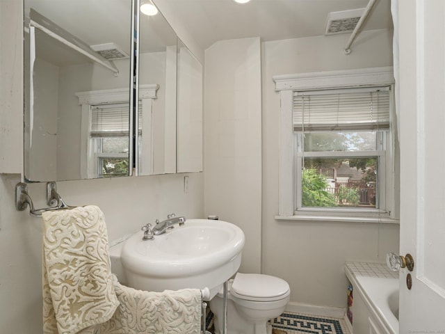 58 Riverdale Ave, Greenwich, CT 06831 - bathroom featuring toilet and baseboards