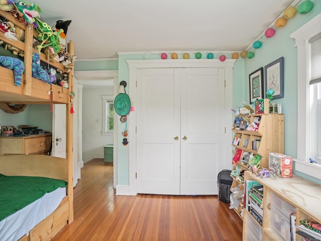 58 Riverdale Ave, Greenwich, CT 06831 - bedroom with light wood-style floors and a closet