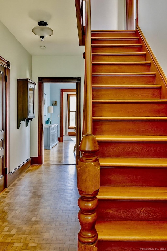 19 Prospect Hill Rd, Groton, CT 06340 - stairway featuring baseboards and brick patterned flooring