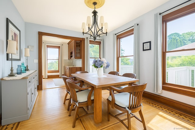 19 Prospect Hill Rd, Groton, CT 06340 - dining room with plenty of natural light, a chandelier, and light wood finished floors