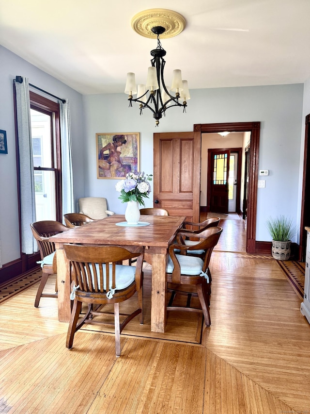 19 Prospect Hill Rd, Groton, CT 06340 - dining space featuring a chandelier and light wood-style floors