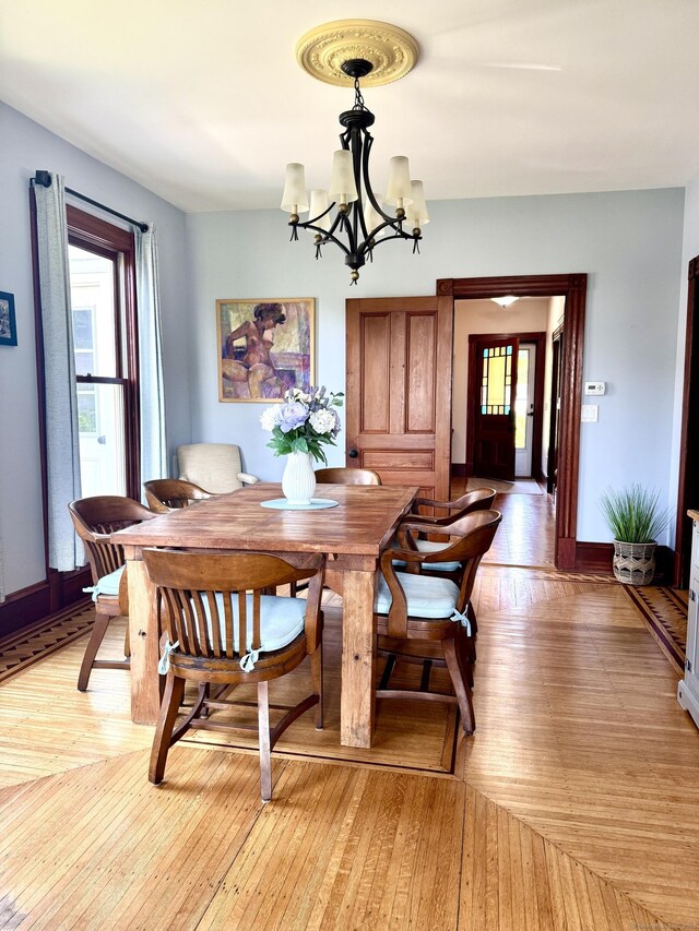 19 Prospect Hill Rd, Groton, CT 06340 - dining area with a chandelier and light wood finished floors