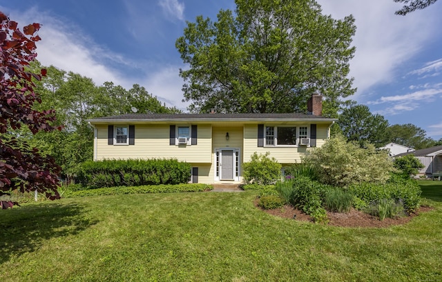480 Budding Ridge Rd, Cheshire, CT 06410 - raised ranch with a chimney and a front lawn