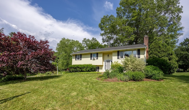 480 Budding Ridge Rd, Cheshire, CT 06410 - split foyer home with a chimney and a front yard