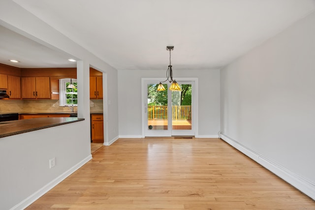 480 Budding Ridge Rd, Cheshire, CT 06410 - unfurnished dining area with a baseboard heating unit, light wood-style floors, and recessed lighting