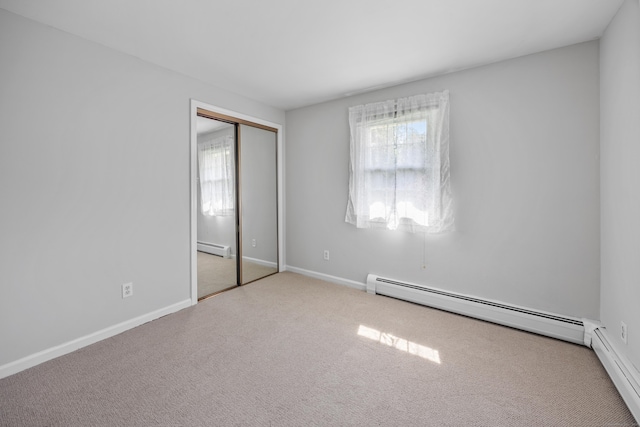 480 Budding Ridge Rd, Cheshire, CT 06410 - unfurnished bedroom with a baseboard heating unit, carpet flooring, and a closet