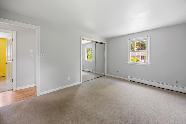 480 Budding Ridge Rd, Cheshire, CT 06410 - unfurnished bedroom with baseboard heating, carpet, and a closet