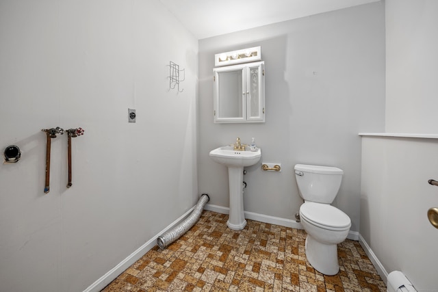 480 Budding Ridge Rd, Cheshire, CT 06410 - half bathroom featuring a baseboard radiator and toilet