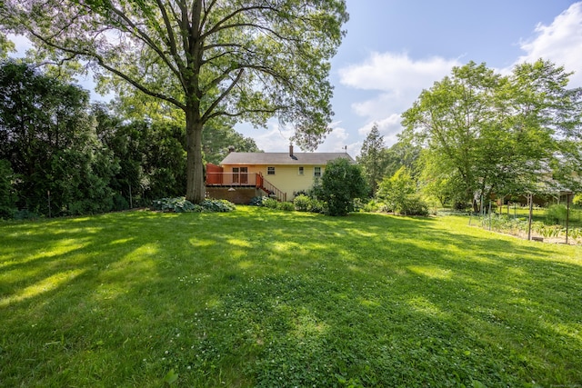 480 Budding Ridge Rd, Cheshire, CT 06410 - view of green lawn featuring a deck