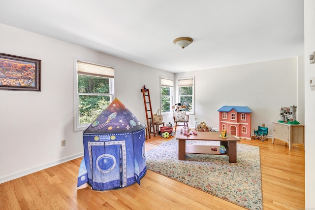 165 Booth Hill Rd, Trumbull, CT 06611 - game room with wood finished floors and baseboards