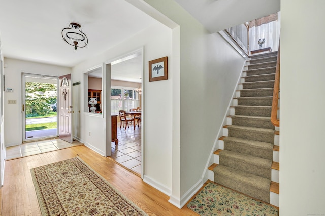 165 Booth Hill Rd, Trumbull, CT 06611 - entryway with light wood-style flooring and stairs