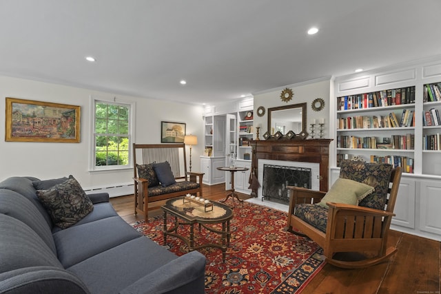 4 Johnny Cake Hill Rd, Old Lyme, CT 06371 - living area featuring baseboard heating, wood finished floors, recessed lighting, built in features, and a fireplace with flush hearth