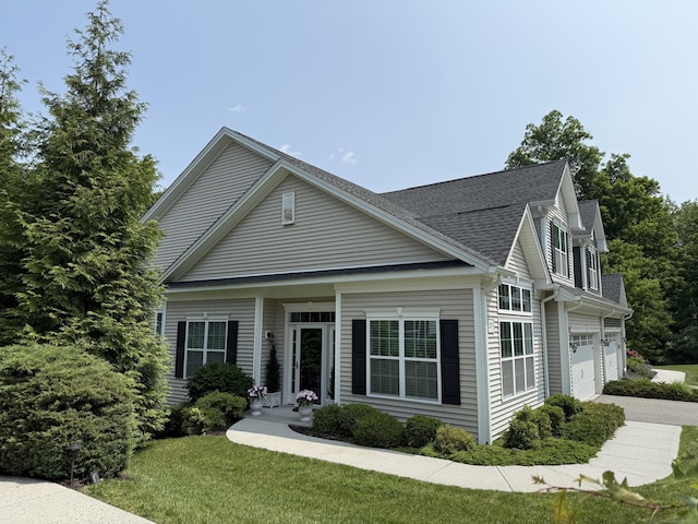 17 Wilderswood Way Unit 17, Danbury, CT 06810 - traditional-style home featuring concrete driveway, a front yard, and roof with shingles